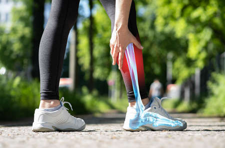 Calf Injury And Cramp Pain. Sport Athlete Joggingの写真素材