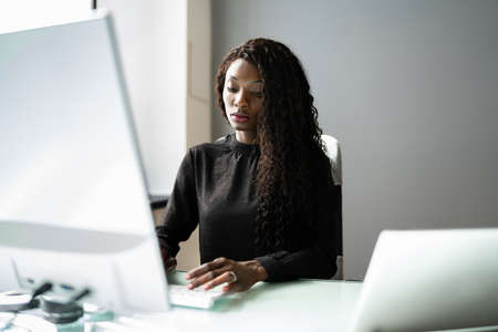 Professional Woman Employee Using Computer For Work