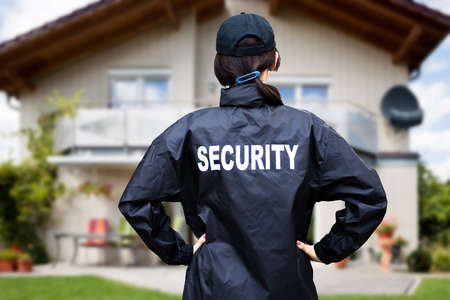 Security Guard Watching House Property. Surveillance Service