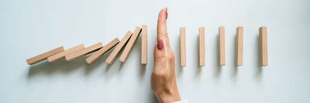 Domino Game Fall Prevention And Change Continuityの写真素材