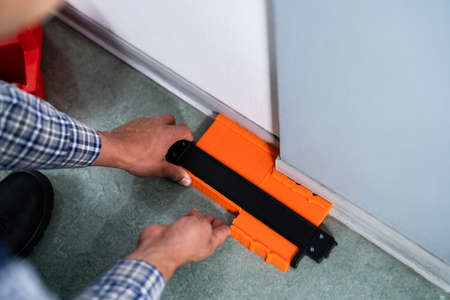 Handyman Using Contour Gauge Tool For Profile Copy