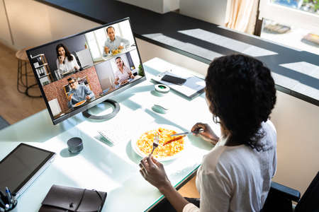 African Women Eating Virtual Video Lunch On PC