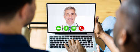 Medical Doctor Video Conference Call On Computer