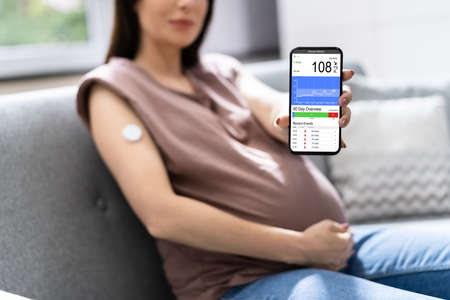 Continuous Glucose Monitor Blood Sugar Test Smart Phone Appの写真素材