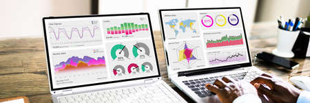 African Advisor Using KPI Dashboard With Financial Analytics Graphsの写真素材