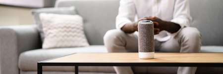 Smart Speaker And Voice Assistant Control On Tableの写真素材