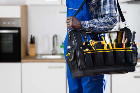 African American Handyman With Repair Box Or Toolboxの写真素材