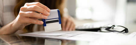 Notary Rubber Stamp In Hand. Official Paper Approved