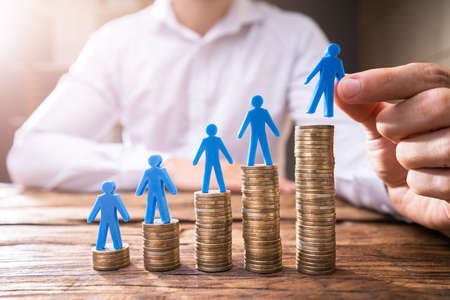 Minimum Wage And Salary Increase. Insurance Compensation And Profitの写真素材