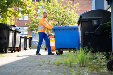 Garbage Removal Man Doing Trash And Rubbish Collection