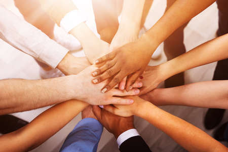 Professional Business Team Huddle And Hands. Diverse Group Management