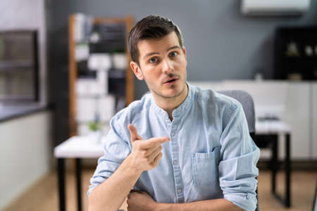 Confident Young Man Video Conference Chat Portrait