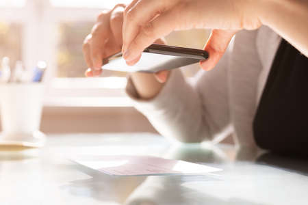 Remote Check Deposit Taking Photo With Mobile Phone