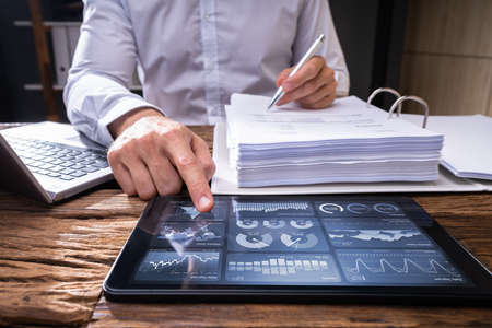 KPI Analytics Dashboard And Graph On Tablet Screen