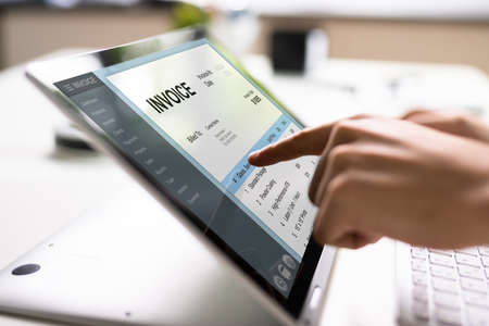 E Invoice On Laptop. Online Electronic Bill Managementの写真素材