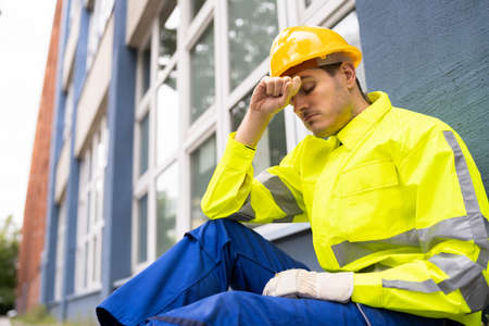 Upset Sad Construction Worker. Unhappy Foreman Contractorの写真素材