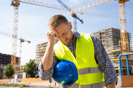 Unhappy Sad Construction Worker. Upset Foreman Frustrationの写真素材