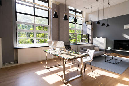 Work From Home Desk With Desktop Computer In Modern Homeの写真素材