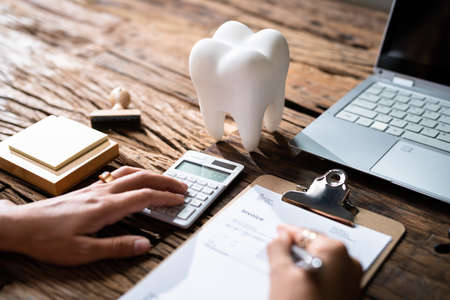 Dental Insurance Money. Dentist Service Desk And Implant Money