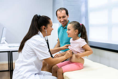 Pediatric Physician Working With Children Patient. Kid Healthcare Test