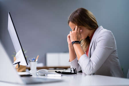 Stressed Upset Business Woman. Bored Worry Businesswomanの写真素材