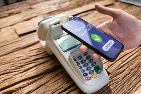 NFC Retail Mobile Payment Using Phone. RFID Checkoutの写真素材