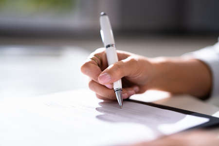 Lawyer Signing Business Contract Paper Document With Penの写真素材
