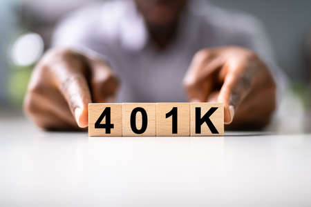 African American Man With 401K Blocks. Income Money Investmentの写真素材