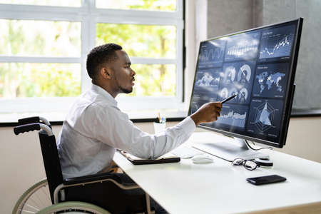 Business Data Analyst Using Computer. African American Advisorの写真素材