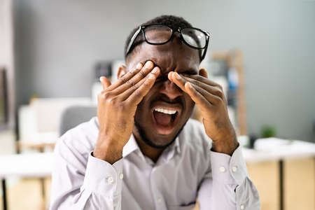 Eye Burning Pain Spasm And Fatigue. Cataract Symptomsの写真素材