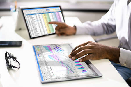 Electronic Spreadsheet Analyst Or Auditor Using Software On Hybrid Laptopの写真素材