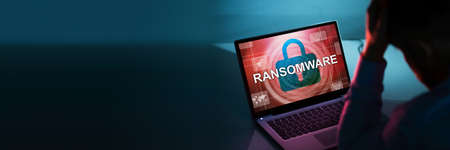 Ransomware Extortion Attack. Hacked Laptop Password. Cyber Securityの写真素材