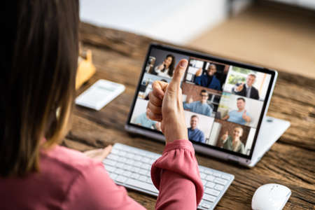 Video Conference Webinar Call On Business Laptop Thumbs Upの写真素材