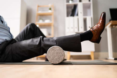 Foam Roller Calves Treatment And Muscle Pressure Releaseの写真素材