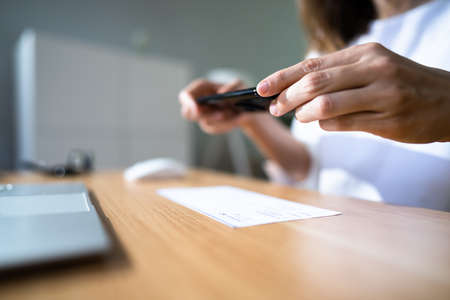 Remote Check Deposit Using Mobile Remote. Online Captureの写真素材