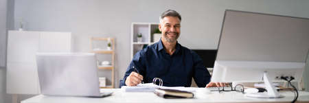 Accounting Bookkeeper Clerk Man. Bank Advisor And Auditorの写真素材