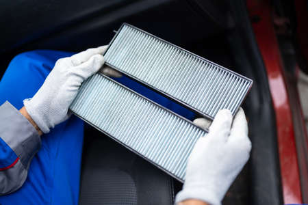 New Clean Car Filter. Vehicle Fresh Air. Automobile Maintenanceの写真素材