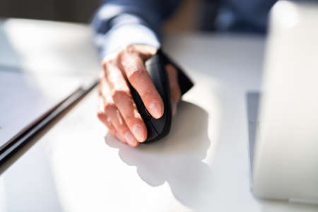 Vertical Ergonomic Optical Mouse For Carpal Tunnel Syndrome Preventionの写真素材