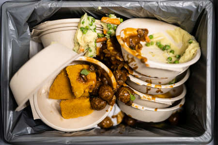 Discarded Leftover Food In Trash Or Dustbin