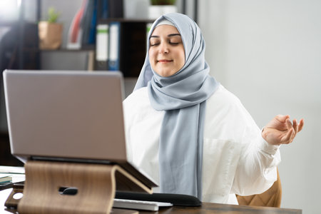 Healthy Yoga And Stress Management In Chair At Workplaceの写真素材