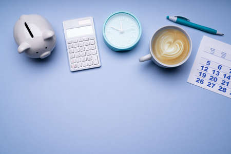 Finance Calculator, Money Piggybank And Time Clockの写真素材
