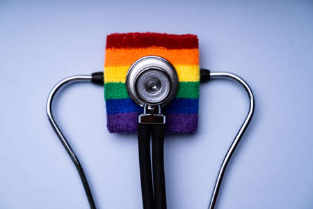 Stethoscope And Rainbow Flag. LGBT And Transsexual Medical Healthの写真素材