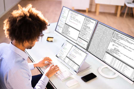 African American Programmer Man Coding On Computer