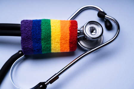 Stethoscope And Rainbow Flag. LGBT And Transsexual Medical Healthの写真素材