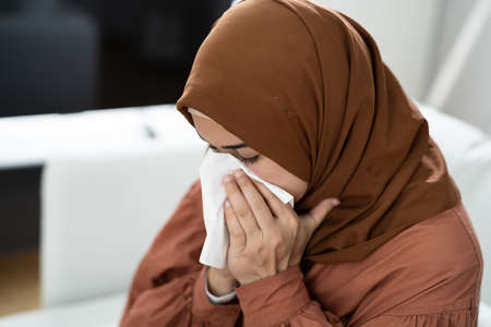 Sneezing Sick Woman Using Allergy Or Flu