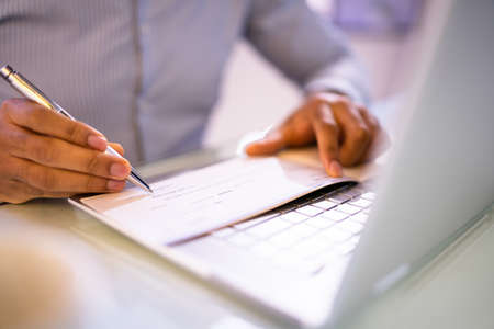 Writing Payroll Compensation Check. Bank Pay Cheque