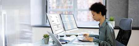 Business Accountant Calculating Tax Invoice In Office