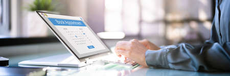 Booking Meeting Appointment On Laptop Computer Online