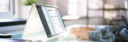 Digital Electronic Bill And Accountant E Invoice On Laptop