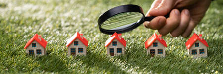 Luxury House And Asset Property Tax Using Magnifying Glassの写真素材